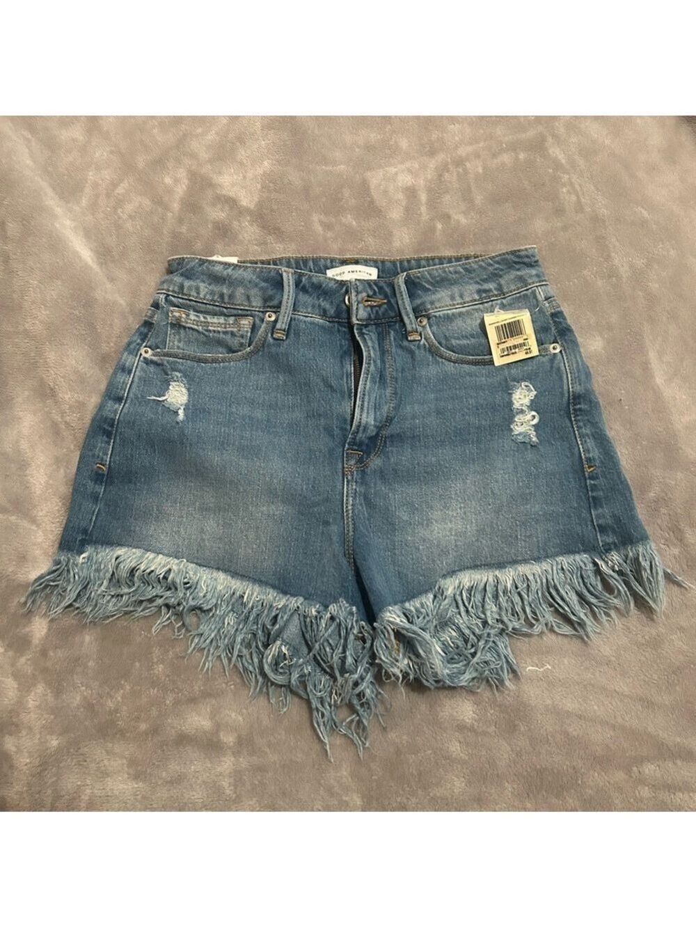 Good American Blue Distressed Jean Shorts with Fringe